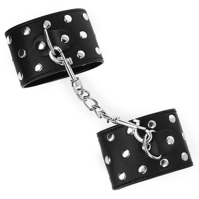KINK - Handgelenkfesseln mit Druckverschluss voller Nieten Schwarz verstellbar 19-24 cm x 5,5 cm