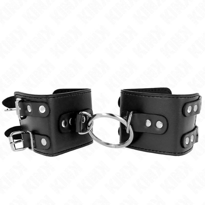 KINK - Feste Handgelenkfesseln mit Ring und Nieten verstellbar Schwarz 17-22 cm x 6,5 cm
