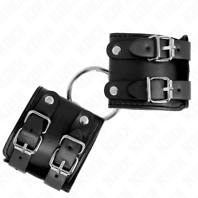 KINK - Feste Handgelenkfesseln mit Ring und Nieten verstellbar Schwarz 17-22 cm x 6,5 cm