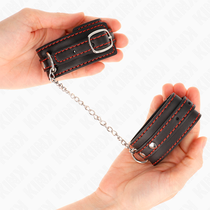 KINK - Kleine Handgelenksfesseln Schwarz mit rotem Futter verstellbar 14-24 cm x 3,5 cm