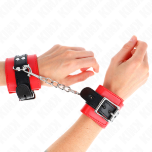 KINK - Handgelenkfesseln Rot mit schwarzem Gürtel verstellbar 17-28 cm x 6 cm