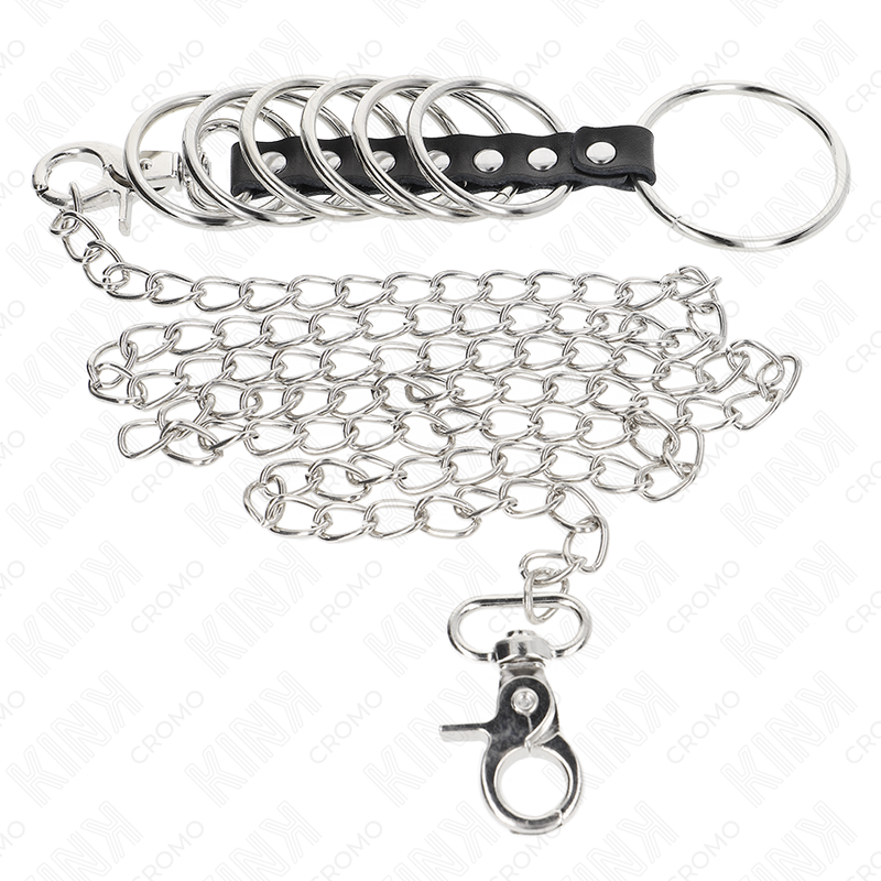 KINK - 7 Penisringe aus Metall 3,8 cm bis 5 cm verbunden mit Leder und Metallkette 100 cm